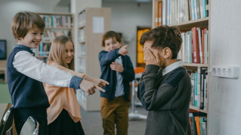 a group of students, bullying a student in the liabrary