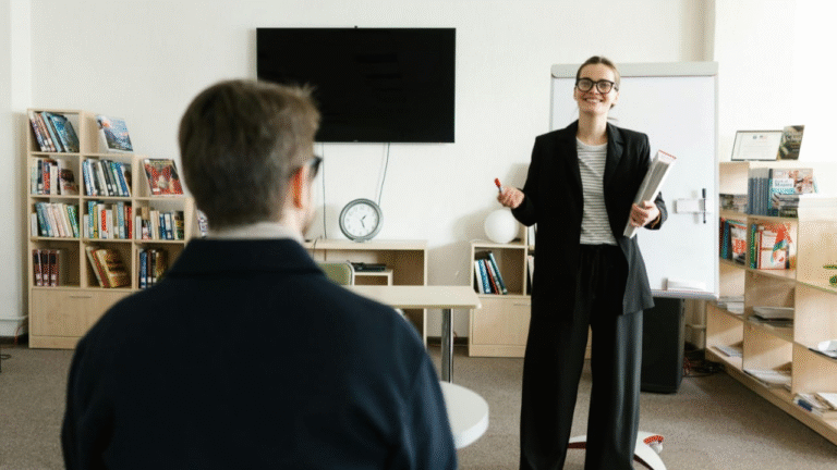 A teacher is having a conversation with a parent